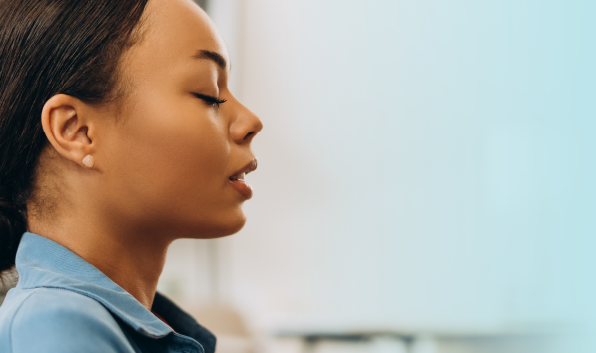 Woman Breathing representing Activating Breathwork