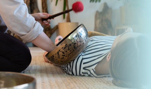 Woman performing Sound Healing